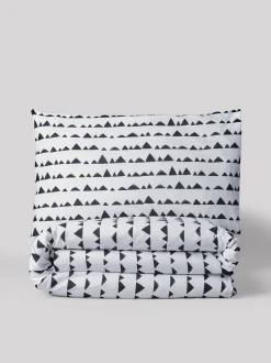 Set van dekbedovertrek en kussensloop van katoenen beddengoed met print