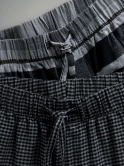 The Set 2 Pack Jersey T-Shirt and Flannel Pyjamas