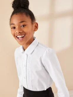 Wit - Schoolblouse met lange mouwen en kantafwerking (3-14 jr)