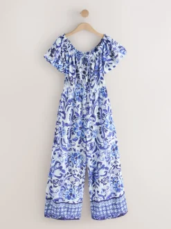 Wit/zwart - Jumpsuit met blote schouder