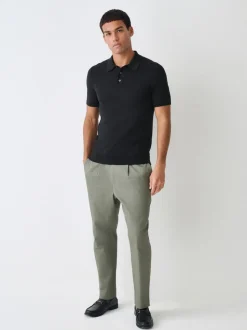 Zwart - Aansluitend - Gebreid poloshirt met hoog katoengehalte en korte mouwen