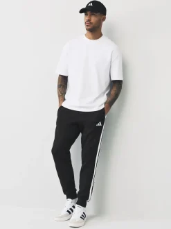 Zwart - adidas Essentials fleece joggingbroek met 3 strepen