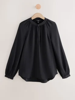 Zwart - Blouse met V-hals en lange mouwen