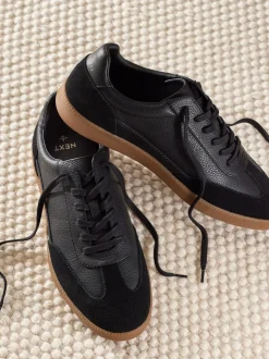 Zwart - Chic-casual vetersneakers met suède afwerking