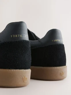 Zwart - Chic-casual vetersneakers met suède afwerking