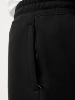 Zwart - Geborstelde jersey shorts met ritszakken