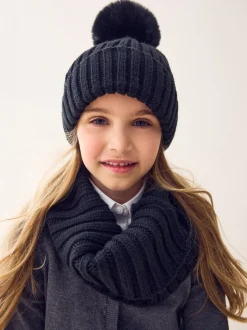 Zwart - Geribbelde beanie-muts met pompon (3mnd -16jr)
