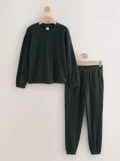 Zwart - Gezellige pyjama met wafeldessin en lange mouwen