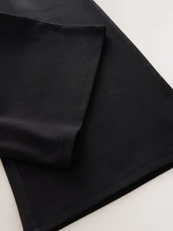 Zwart - Jersey broek met wijde pijpen, stretch en hoog katoengehalte (3-17jr)