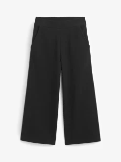 Zwart - Jersey broek met wijde pijpen (3-16 jr)