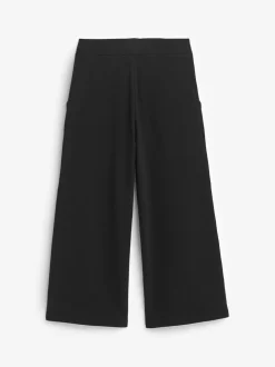 Zwart - Jersey broek met wijde pijpen (3-16 jr)