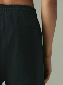Zwart - Joggingbroek van keperstof met rechte pijpen en textuur