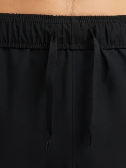 Zwart - Nike Dri-FIT Form trainingsbroek met taps toelopende pijpen