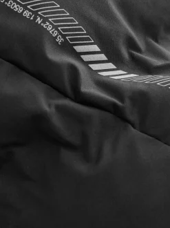 Zwart - Regenbestendige gewatteerde jas met microfleece voering (3-17jr)
