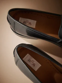 Zwart - Signature - Italiaanse penny-loafers van leer