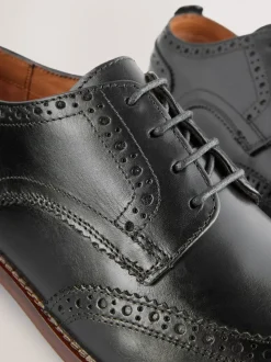 Zwart - Standaard pasvorm - Brogues van leer met contrasterende zool