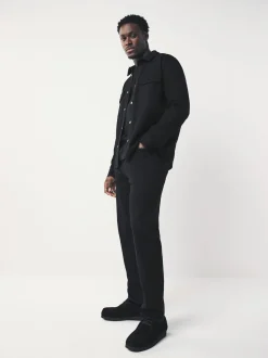 Zwart - Standaard toelopende pasvorm - Motionflex jeans