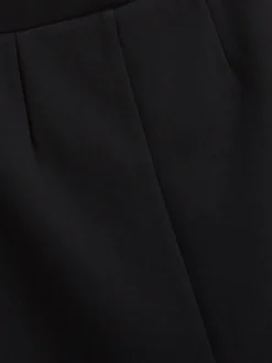 Zwart - Stretchkokerrok van jersey met elastische taille voor senioren (9-18jr)