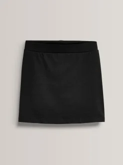 Zwart - Stretchy katoenen jersey schoolschort (3 - 16 jr)