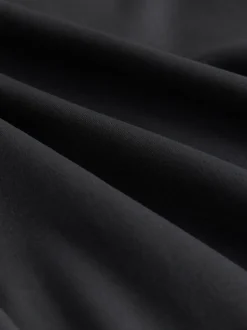 Zwart - Superzachte Dry Tech yogasportleggings met uitlopende pijpen