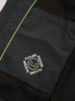 Zwart - Waterdichte jas met fleece voering en capuchon (3-17jr)