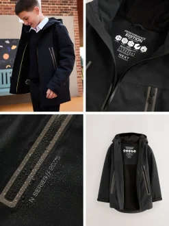 Zwart - Waterdichte jas met fleece voering en capuchon (3-17jr)