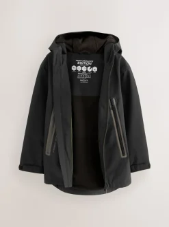 Zwart - Waterdichte jas met fleece voering en capuchon (3-17jr)