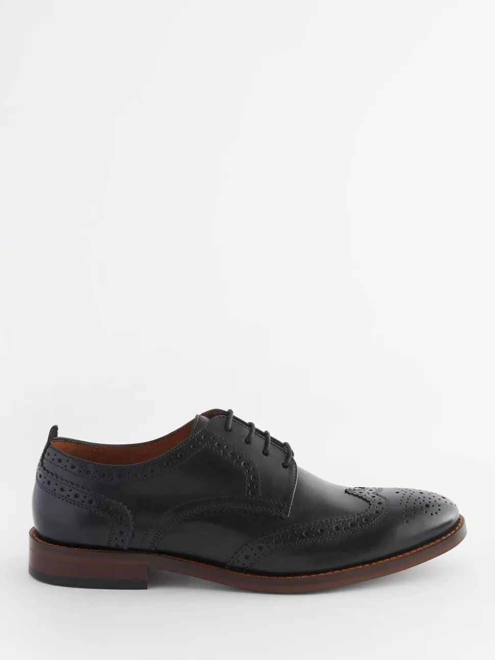 Zwart - Wijde pasvorm - Brogues van leer met contrasterende zool
