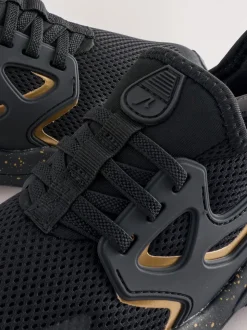 Zwart/goud - Elastische sportschoenen