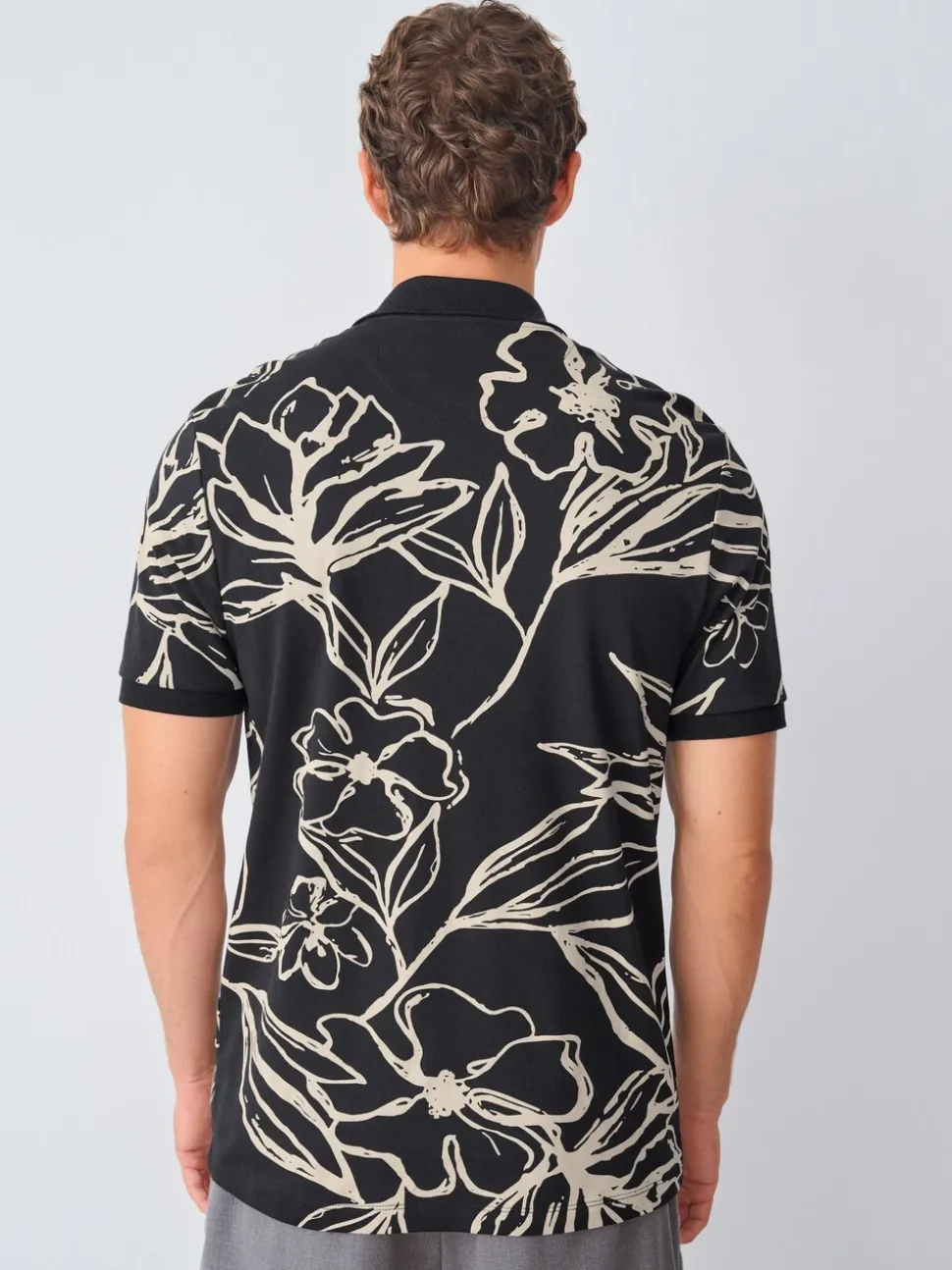 Zwartgoud met bloemenprint - Poloshirt met korte mouwen en print