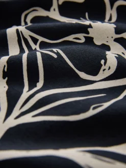Zwartgoud met bloemenprint - Poloshirt met korte mouwen en print
