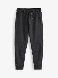 Zwart/marineblauw - Slim-fit joggingbroek met ritszak (3-16jr)