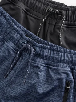 Zwart/marineblauw - Slim-fit joggingbroek met ritszak (3-16jr)