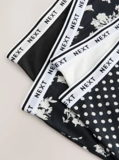Zwart/wit met bloemenprint - 4 Katoenen slipjes met logotailleband