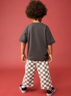 Zwart/wit met dambordpatroon - Wijde broek met elastische taille (3mnd-7jr)