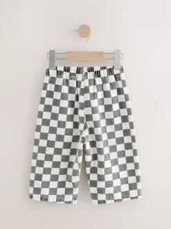 Zwart/wit met dambordpatroon - Wijde broek met elastische taille (3mnd-7jr)