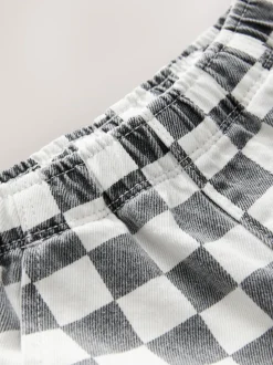 Zwart/wit met dambordpatroon - Wijde broek met elastische taille (3mnd-7jr)