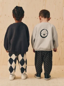 Zwart/wit met print - Set met sweatshirt en joggingbroek met strepen (3mnd-7jr)