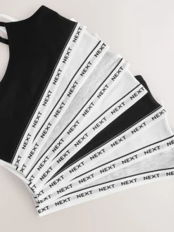 Zwart/wit/grijs - Set van 7 crop tops met bandjes (5 - 16 jr)